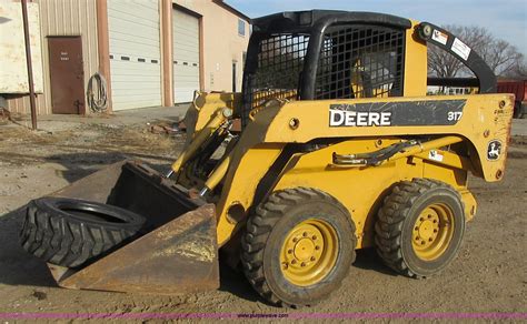 how to move a john deere 317 skid steer|john deere 317 price.